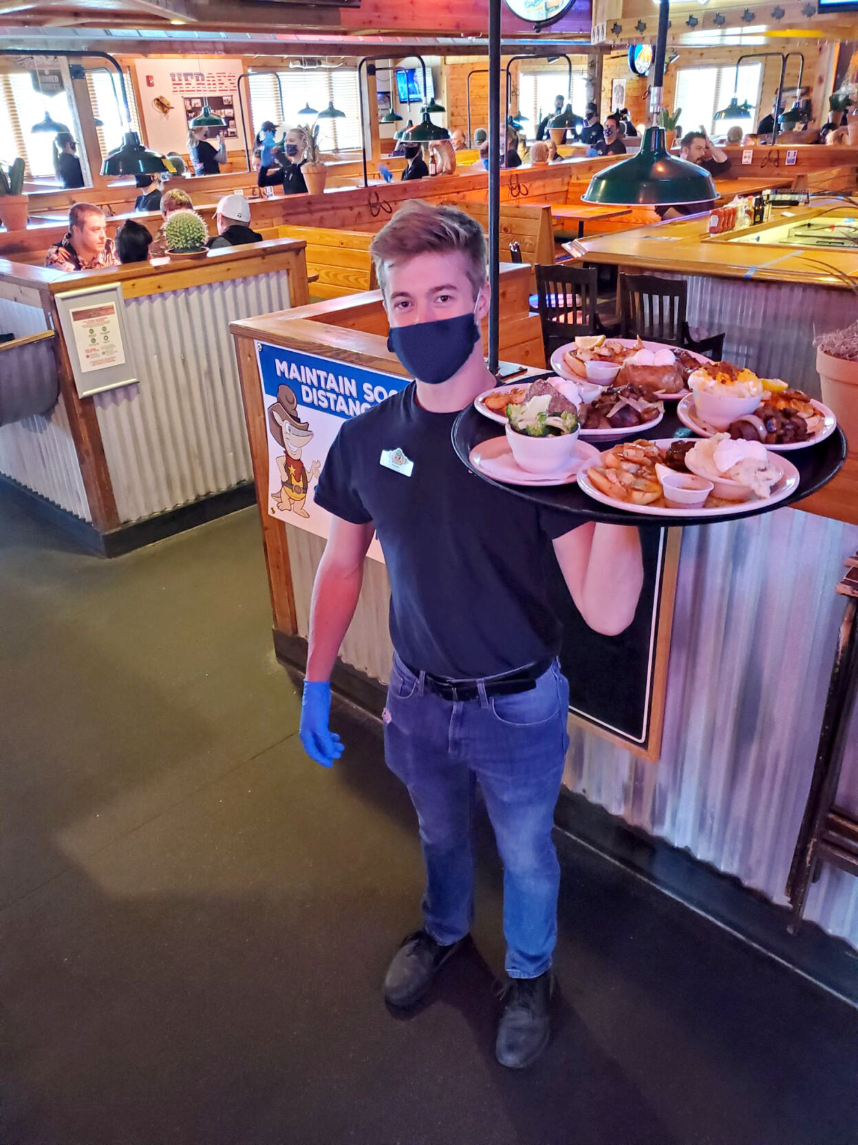 Server holds tray of food - mask.jpg